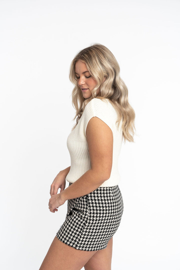 Angela: Sustainable Cap Sleeve Mock Neck Ribbed Sweater